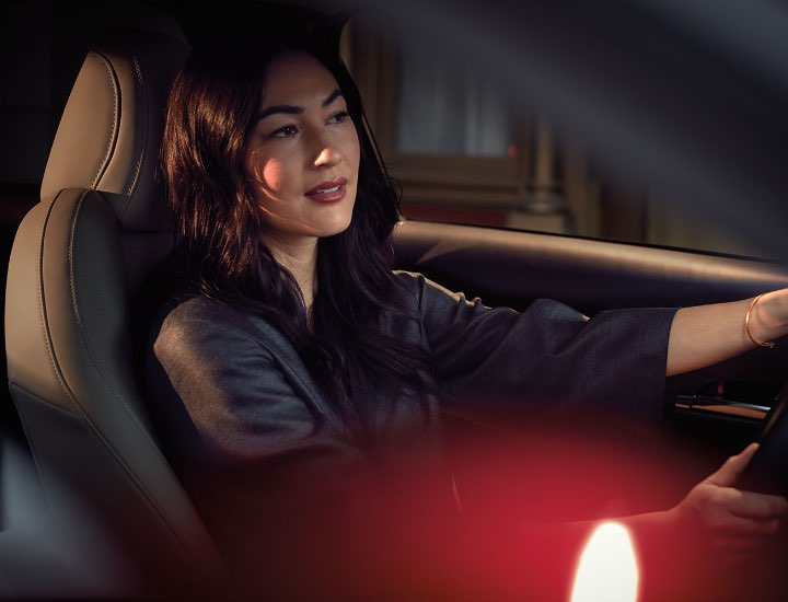 Smiling Woman Driving
